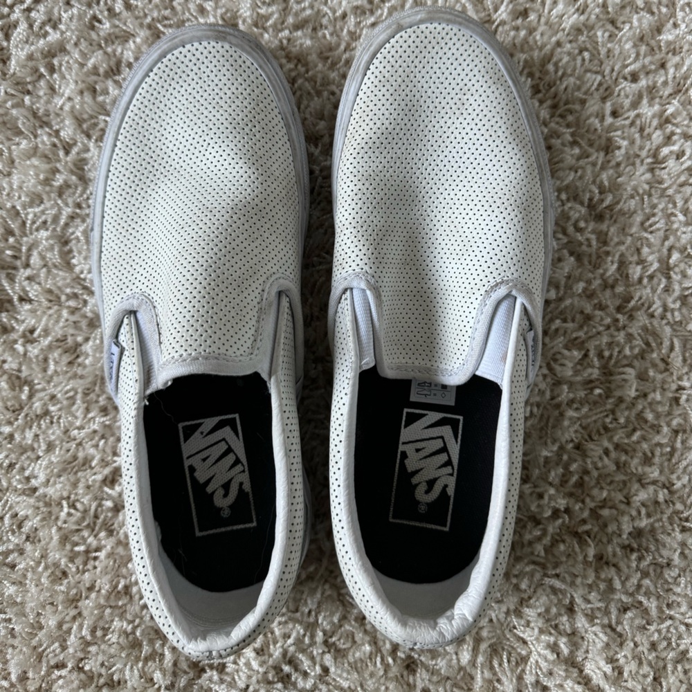 White slip on Vans